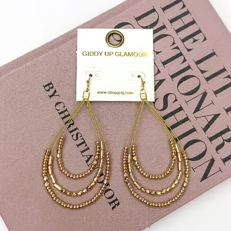 Layered Open Teardrop Earrings With Beads in Gold Tone