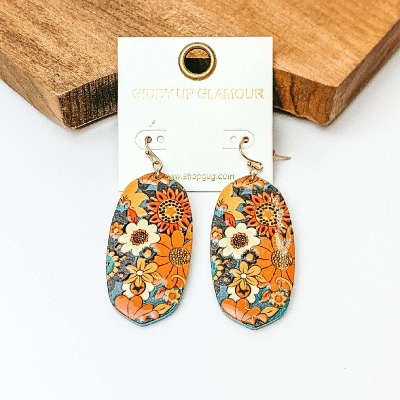 Wooden Oval Drop Earrings with a Floral Print in Rust and Navy Mix